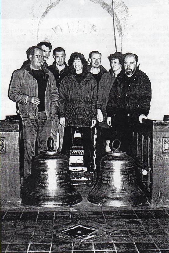 Seven bell ringers with two new bells