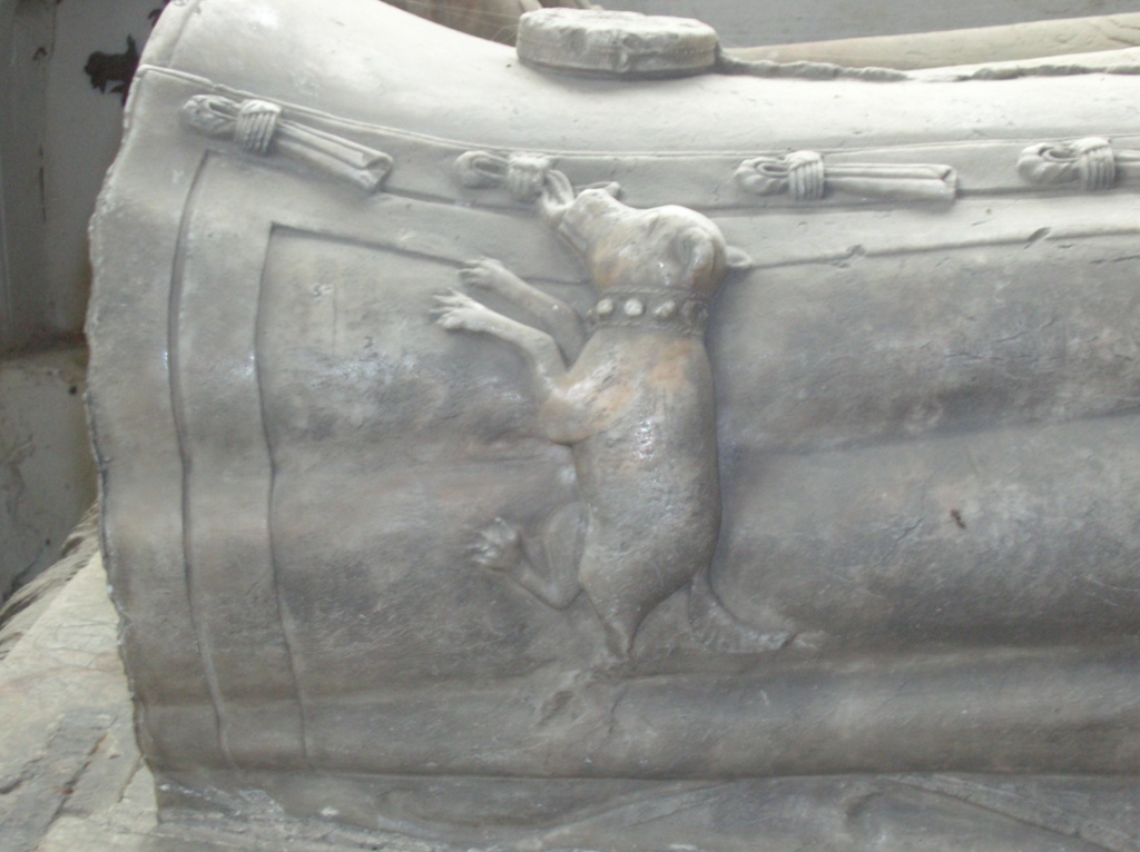 A small carved dog on the dress of Brigitta Fermor's effigy