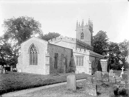 An early photograph of the church from the east, with headstones in the foreground