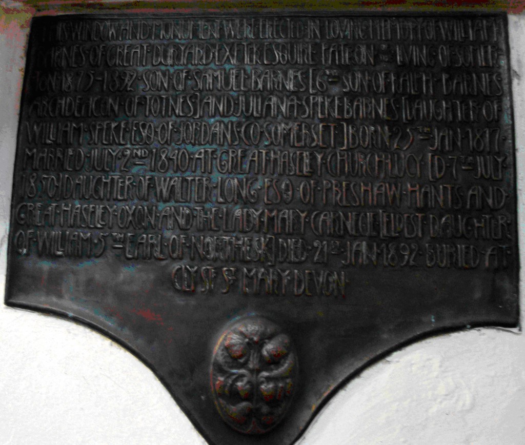 A bronze memorial plaque to the Revd George Edward Barnes
